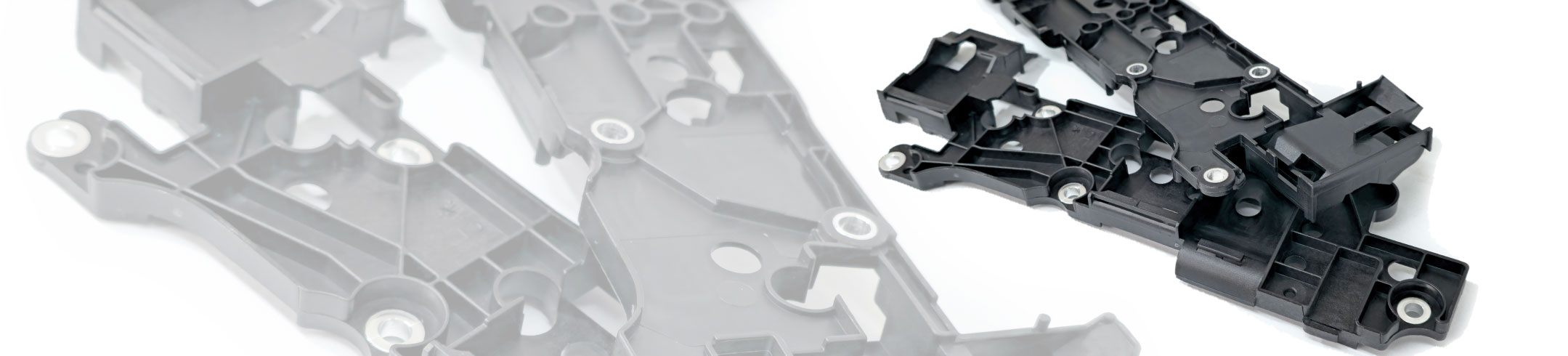 nsert-Molding / Metallumspritzungs Kunststoffteil schwarz, Hersteller Fertigung Produzent Leiferant Schnitzler Kunststofftechnik in Küps bei Kronach, Region Oberfranken, Bayern, Deutschland